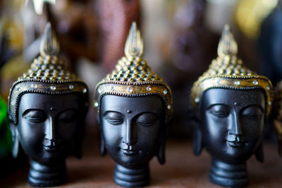 Buddha figurines on table