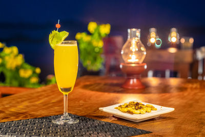 Lit candles on table at restaurant