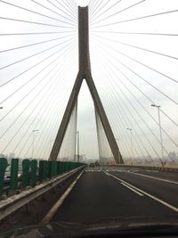 Suspension bridge against sky