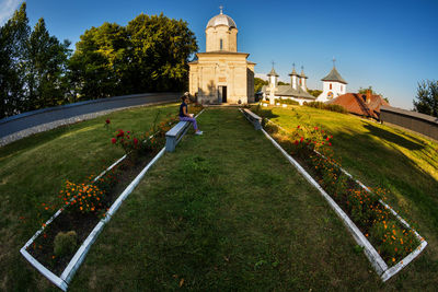 Woman in front of church