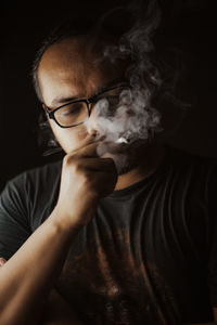 Portrait of a man doing smoking