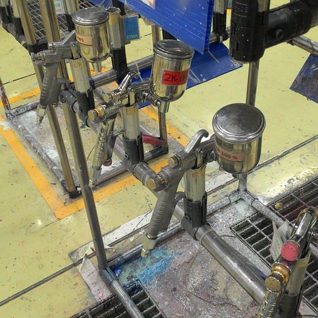 high angle view, metal, metallic, equipment, indoors, industry, large group of objects, factory, machinery, container, abundance, day, still life, pipe - tube, no people, variation, in a row, work tool, workshop