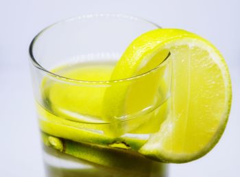 Close-up of lemon in glass