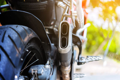 Close-up of motorcycle on street