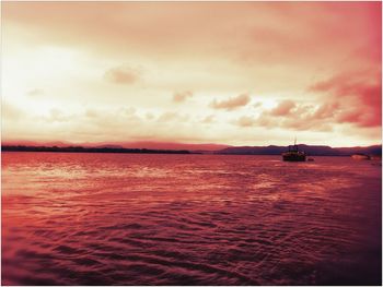 Scenic view of sea at sunset