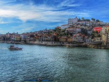 Scenic view of cityscape against sky