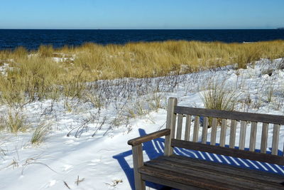 Scenic view of sea against sky during winter