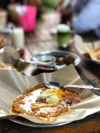 Close-up of omelet in plate on table