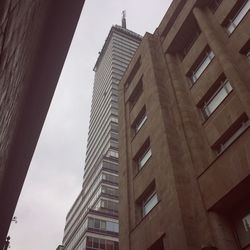 Low angle view of skyscrapers against sky