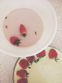 High angle view of red cake in plate