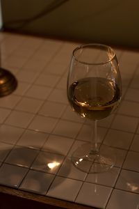 High angle view of wine glass on table