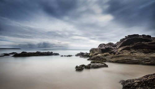 Rocks in calm sea