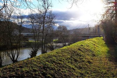 Scenic view of canal against sky