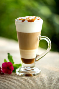 Close-up of coffee served on table