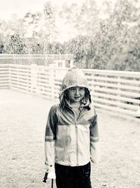 Full length of girl standing on field