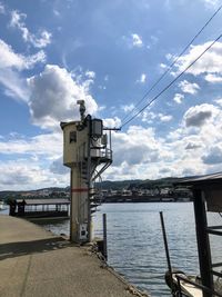 View of pier on sea against sky