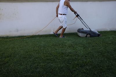 Low section of man working in the yard