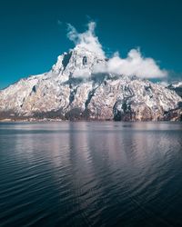 Scenic view of lake against blue sky