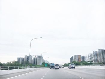 Road passing through city