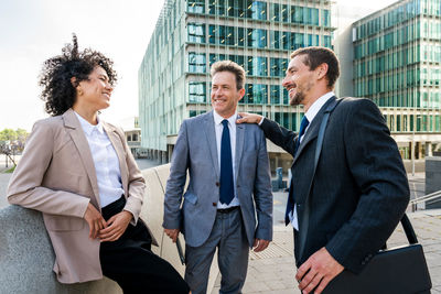 Business colleagues standing in city