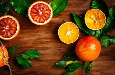 Directly above shot of orange fruits on table