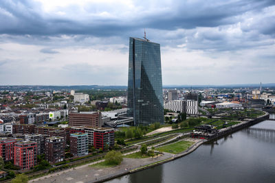 Buildings in city against sky