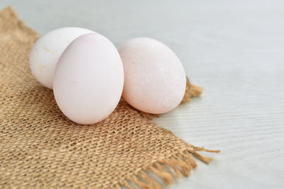 Close-up of eggs on table