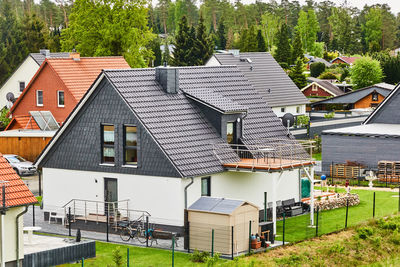 High angle view of houses and buildings in town