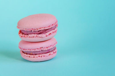 Close-up of pink stack against white background