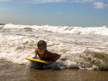 Portrait of boy in sea