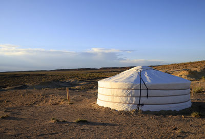 Scenic view of desert against sky