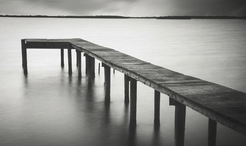 Wooden jetty over river