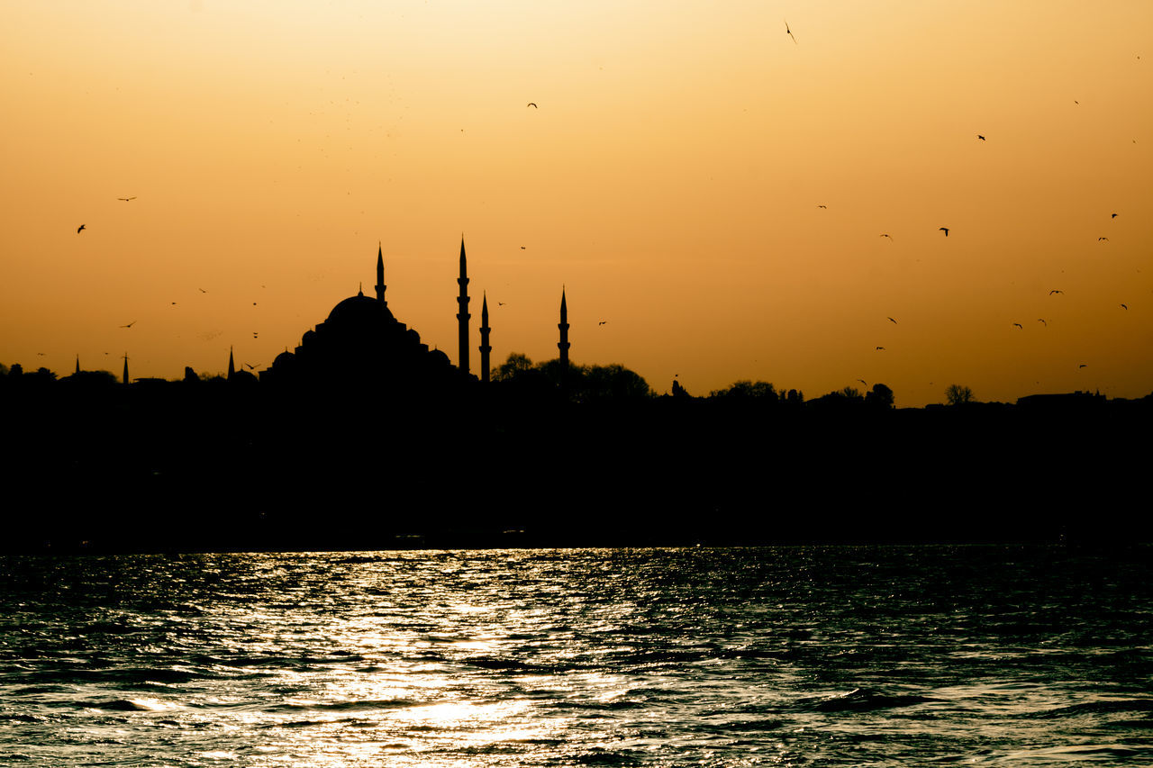 SILHOUETTE OF CHURCH AT SUNSET