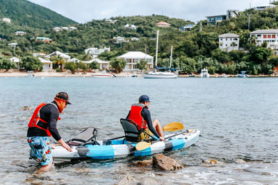 People on boat in sea