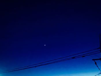 Low angle view of blue sky at night