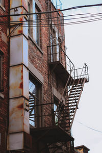 Low angle view of stairs against sky