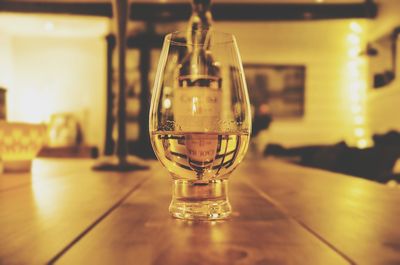 Close-up of wine glass on table