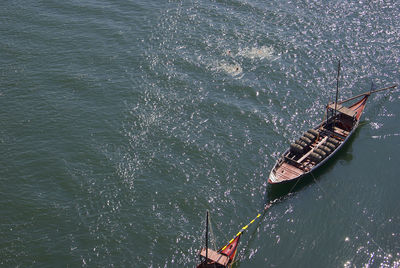 High angle view of ship sailing in sea