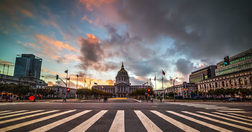 City street against cloudy sky