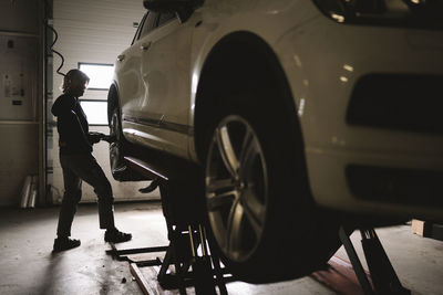 Female mechanic in garage