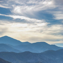Scenic view of mountains against sky during sunset