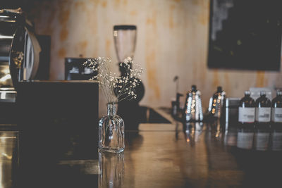 Wine bottles on table in restaurant