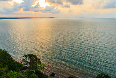 Scenic view of sea against sky at sunset