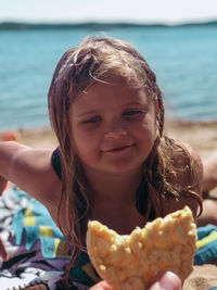 Portrait of a girl smiling on beach 