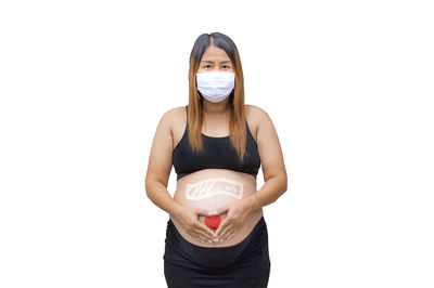 Portrait of a beautiful young woman over white background