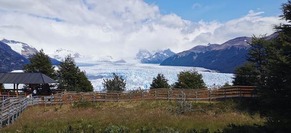 Panoramic view of snowcapped mountains against sky