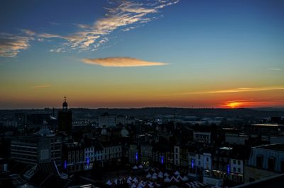 Aerial view of cityscape at sunset