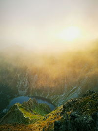 Sunrise over the lakes in the polish tatras. photo taken from the peak of kazalnica tatry