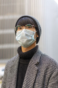 Portrait of young man wearing mask