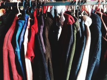 Close-up of clothes hanging on display at store